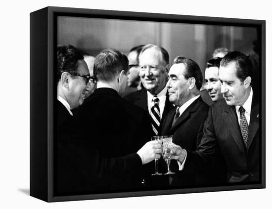 Pres Richard Nixon and Henry Kissinger Clink Champagne Glasses to Toast-null-Framed Stretched Canvas