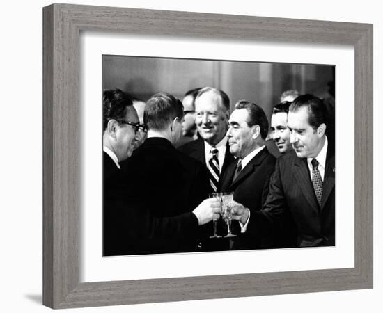 Pres Richard Nixon and Henry Kissinger Clink Champagne Glasses to Toast-null-Framed Photo