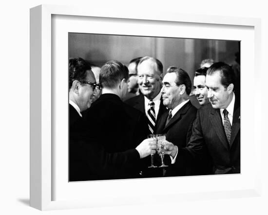 Pres Richard Nixon and Henry Kissinger Clink Champagne Glasses to Toast-null-Framed Photo