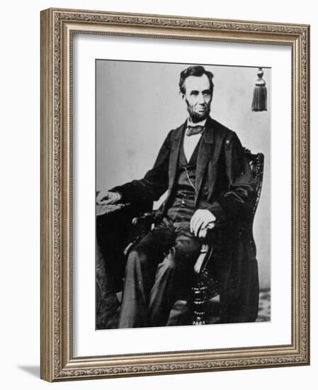 President Abraham Lincoln Sitting in a Chair-null-Framed Photographic Print