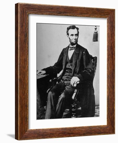 President Abraham Lincoln Sitting in a Chair-null-Framed Photographic Print