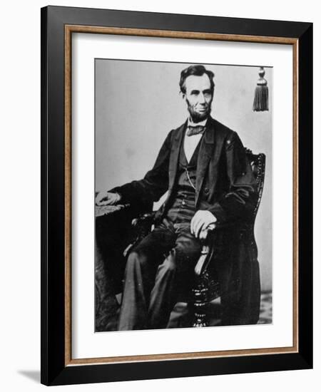 President Abraham Lincoln Sitting in a Chair-null-Framed Photographic Print