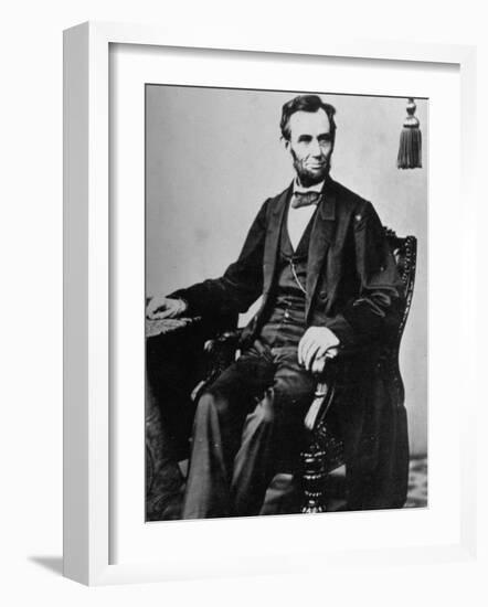 President Abraham Lincoln Sitting in a Chair-null-Framed Photographic Print