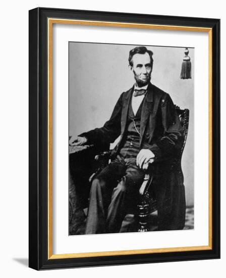 President Abraham Lincoln Sitting in a Chair-null-Framed Photographic Print