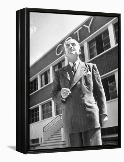 President and Director of Coty Perfumes Andre Lavault in Front of Building Holding Cigarette-Hans Wild-Framed Premier Image Canvas