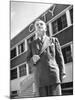 President and Director of Coty Perfumes Andre Lavault in Front of Building Holding Cigarette-Hans Wild-Mounted Premium Photographic Print