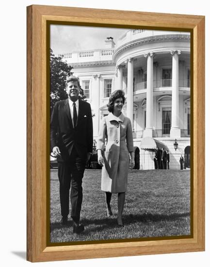 President and Mrs. John F. Kennedy Walking on the South Lawn of the White House on April 16, 1962-null-Framed Stretched Canvas