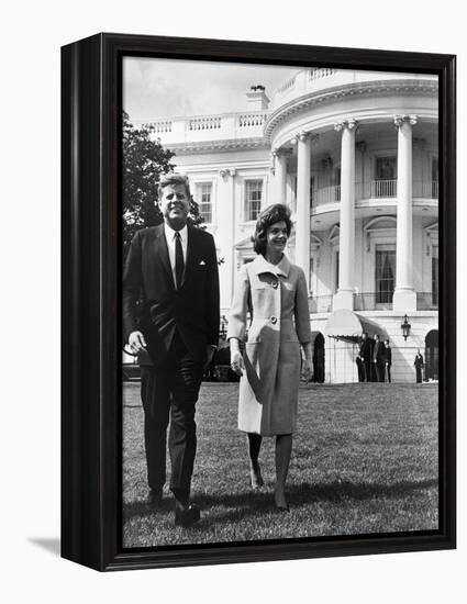 President and Mrs. John F. Kennedy Walking on the South Lawn of the White House on April 16, 1962-null-Framed Stretched Canvas