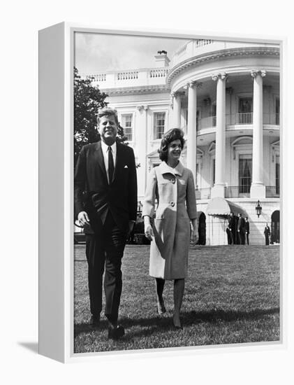 President and Mrs. John F. Kennedy Walking on the South Lawn of the White House on April 16, 1962-null-Framed Stretched Canvas