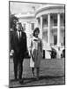 President and Mrs. John F. Kennedy Walking on the South Lawn of the White House on April 16, 1962-null-Mounted Photo