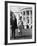 President and Mrs. John F. Kennedy Walking on the South Lawn of the White House on April 16, 1962-null-Framed Photo