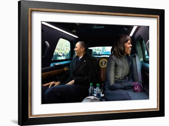 President Barack Obama and First Lady Michelle Obama Ride in the Inaugural Parade-null-Framed Photo