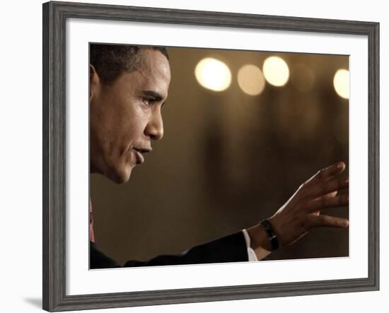 President Barack Obama Answers a Question During His First Prime Time Televised News Conference-null-Framed Photographic Print
