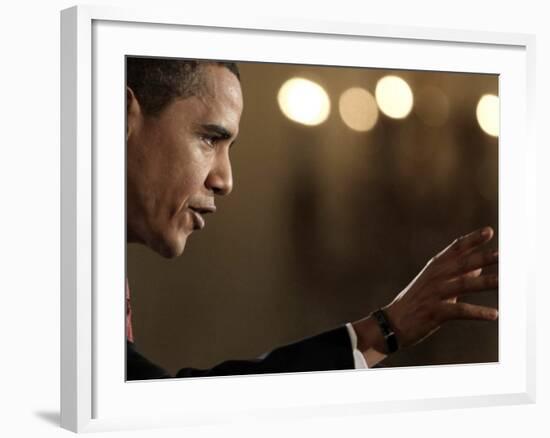 President Barack Obama Answers a Question During His First Prime Time Televised News Conference-null-Framed Photographic Print