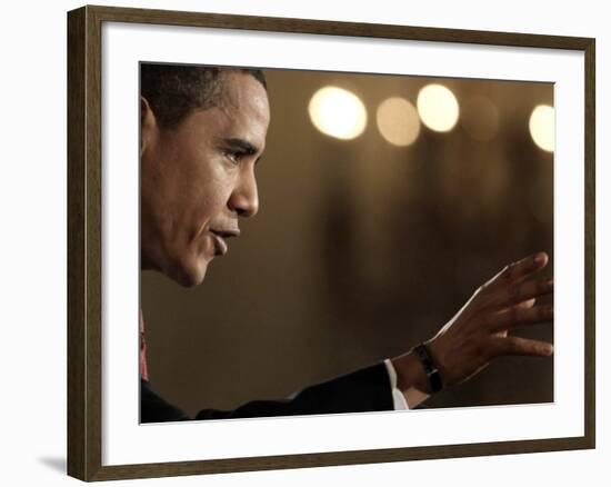 President Barack Obama Answers a Question During His First Prime Time Televised News Conference-null-Framed Photographic Print