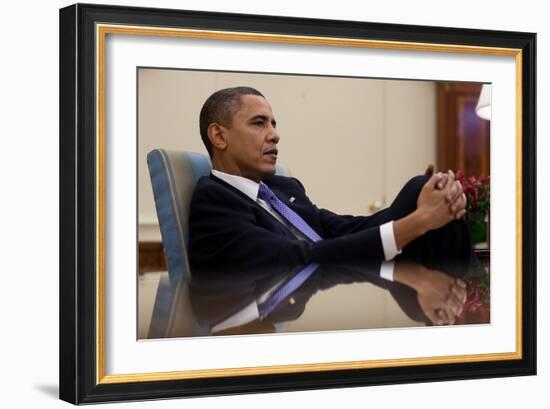 President Barack Obama Leans Back During a Meeting in the Oval Office, Feb. 22, 2010-null-Framed Photo