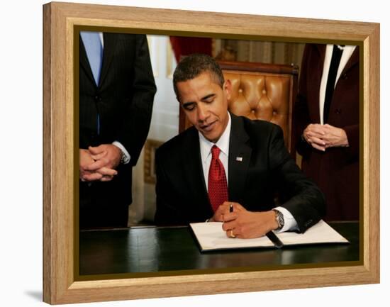 President Barack Obama Signs His First Act as President in the President's Room, January 20, 2009-null-Framed Premier Image Canvas