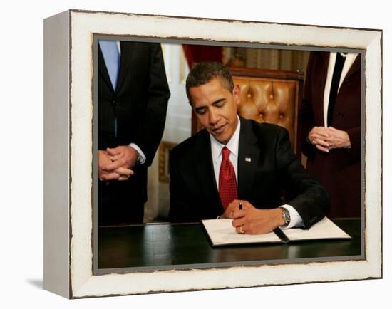 President Barack Obama Signs His First Act as President in the President's Room, January 20, 2009-null-Framed Premier Image Canvas