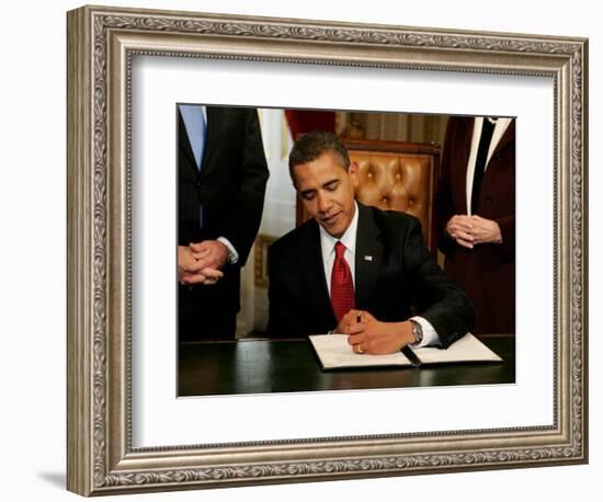 President Barack Obama Signs His First Act as President in the President's Room, January 20, 2009-null-Framed Premium Photographic Print