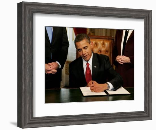 President Barack Obama Signs His First Act as President in the President's Room, January 20, 2009-null-Framed Premium Photographic Print