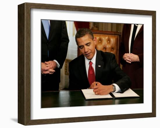 President Barack Obama Signs His First Act as President in the President's Room, January 20, 2009-null-Framed Photographic Print