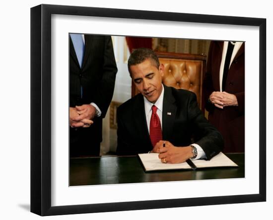 President Barack Obama Signs His First Act as President in the President's Room, January 20, 2009-null-Framed Photographic Print