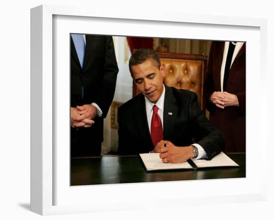 President Barack Obama Signs His First Act as President in the President's Room, January 20, 2009-null-Framed Photographic Print