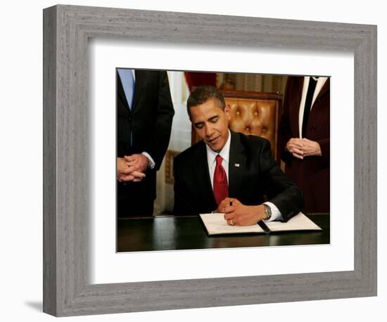 President Barack Obama Signs His First Act as President in the President's Room, January 20, 2009-null-Framed Photographic Print