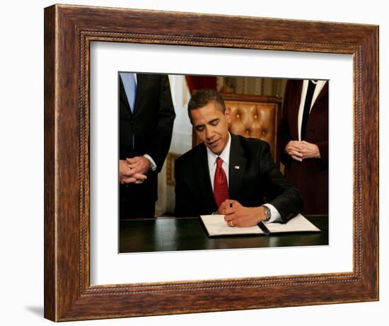 President Barack Obama Signs His First Act as President in the President's Room, January 20, 2009-null-Framed Photographic Print