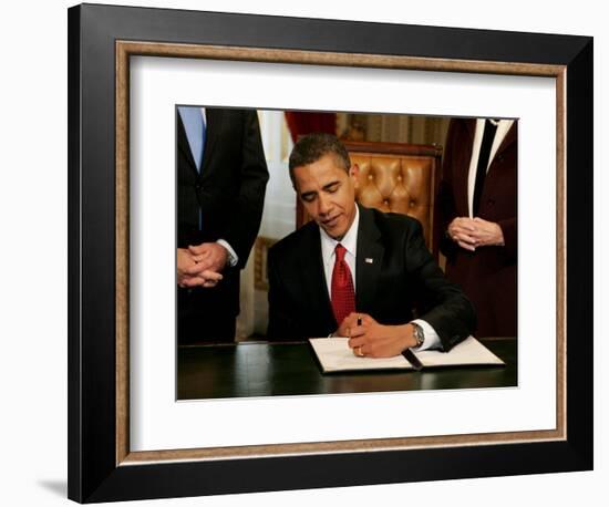 President Barack Obama Signs His First Act as President in the President's Room, January 20, 2009-null-Framed Photographic Print