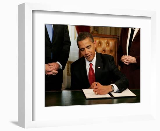 President Barack Obama Signs His First Act as President in the President's Room, January 20, 2009-null-Framed Photographic Print