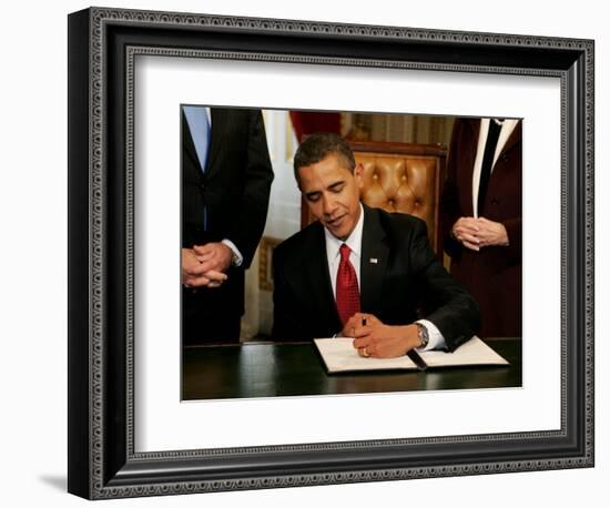 President Barack Obama Signs His First Act as President in the President's Room, January 20, 2009-null-Framed Photographic Print