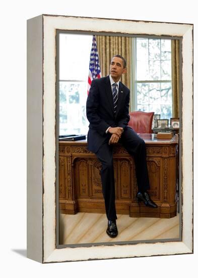 President Barack Obama Sits on the Edge of the Resolute Desk in the Oval Office, April 30, 2010-null-Framed Stretched Canvas