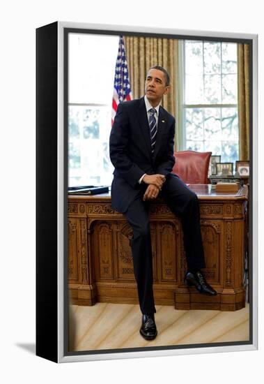 President Barack Obama Sits on the Edge of the Resolute Desk in the Oval Office, April 30, 2010-null-Framed Stretched Canvas