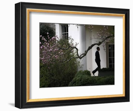 President Barack Obama Walks Down the Colonnade to the Oval Office of the White House-null-Framed Photographic Print