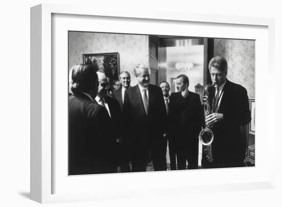 President Bill Clinton Plays the Saxophone Presented to Him by Russian President Boris Yeltsin-null-Framed Premium Photographic Print