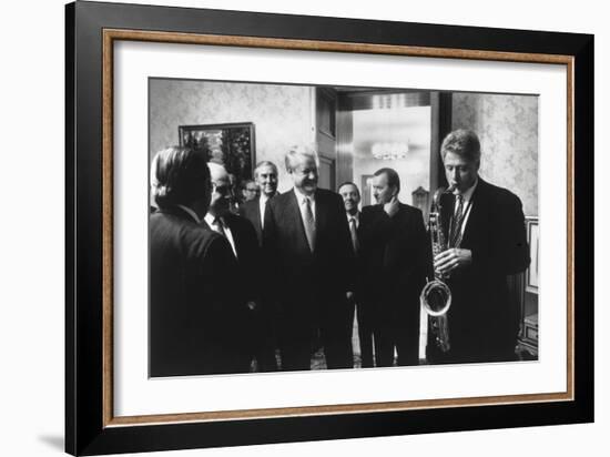 President Bill Clinton Plays the Saxophone Presented to Him by Russian President Boris Yeltsin-null-Framed Photo