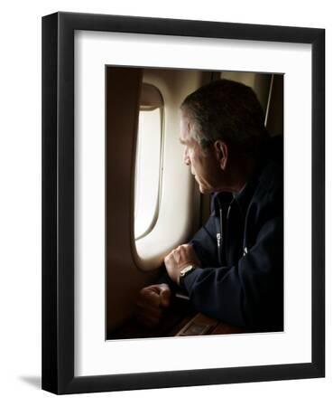 'President Bush Looks out the Window of Air Force One Over New