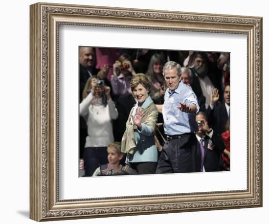 President Bush, Right, and First Lady Laura Bush Arrive for a Rally for Texas Governor Rick Perry-Lm Otero-Framed Photographic Print