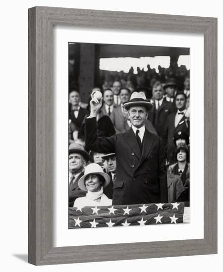 President Calvin Coolidge (1872-1933) Throws Out the First Ball of the 1924 World Series, 1924-American Photographer-Framed Photographic Print