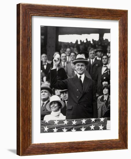 President Calvin Coolidge (1872-1933) Throws Out the First Ball of the 1924 World Series, 1924-American Photographer-Framed Photographic Print