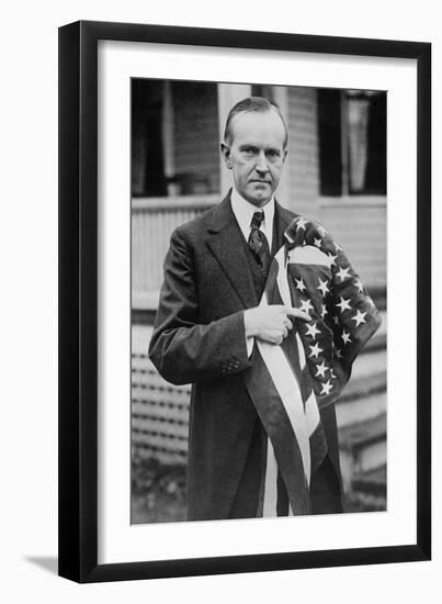 President Calvin Coolidge Holding an American Flag. May 2, 1924-null-Framed Premium Photographic Print