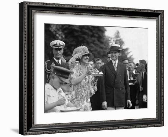 President Calvin Coolidge Smiles Along with His Wife at a White House Garden Party in June 1926-null-Framed Art Print