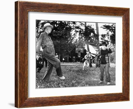President Eisenhower Adds a Little 'Body English' to David Eisenhower's Golf Swing-null-Framed Photo