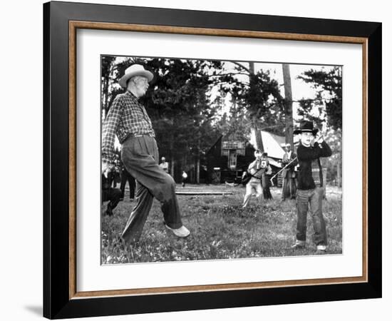 President Eisenhower Adds a Little 'Body English' to David Eisenhower's Golf Swing-null-Framed Photo