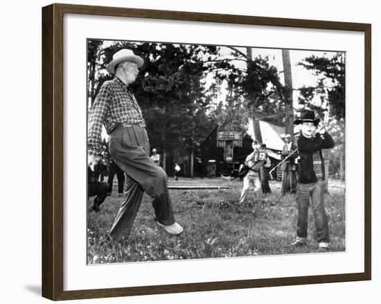 President Eisenhower Adds a Little 'Body English' to David Eisenhower's Golf Swing-null-Framed Photo