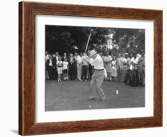 President Eisenhower Teeing Off on a Golf Course, Summer 1957-null-Framed Photo