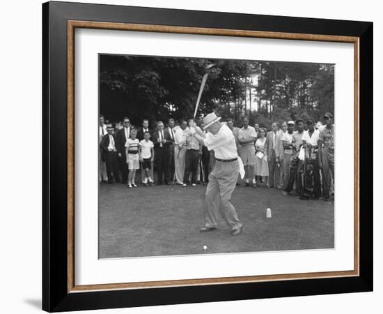 President Eisenhower Teeing Off on a Golf Course, Summer 1957-null-Framed Photo