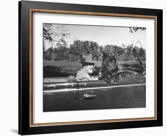 President Franklin D. Roosevelt Driving in His Convertible with His Dog Fala Through Hyde Park-George Skadding-Framed Photographic Print