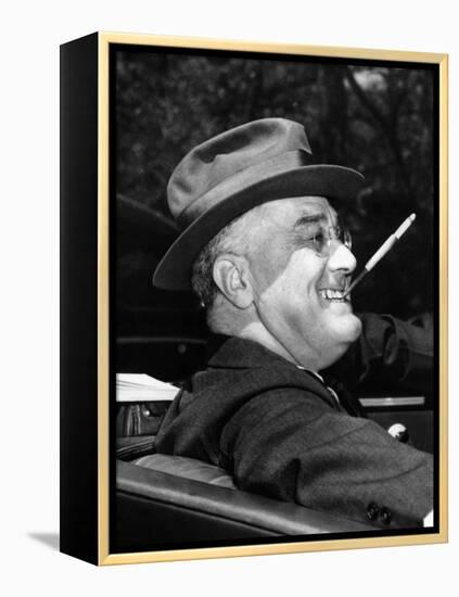 President Franklin Roosevelt, Debonair with His Cigarette Holder, 1939-null-Framed Stretched Canvas